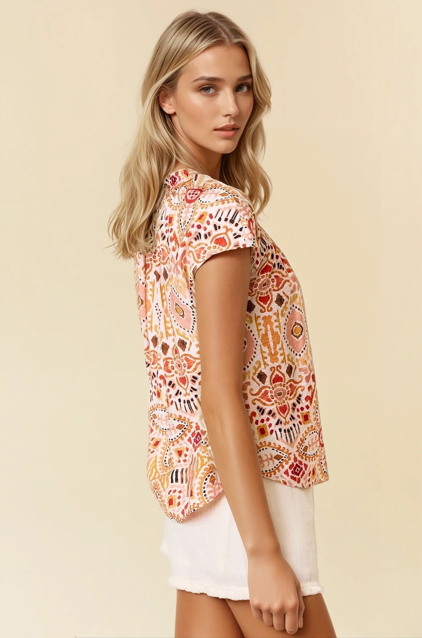 Ikat Print Ruffled Neck Blouse
