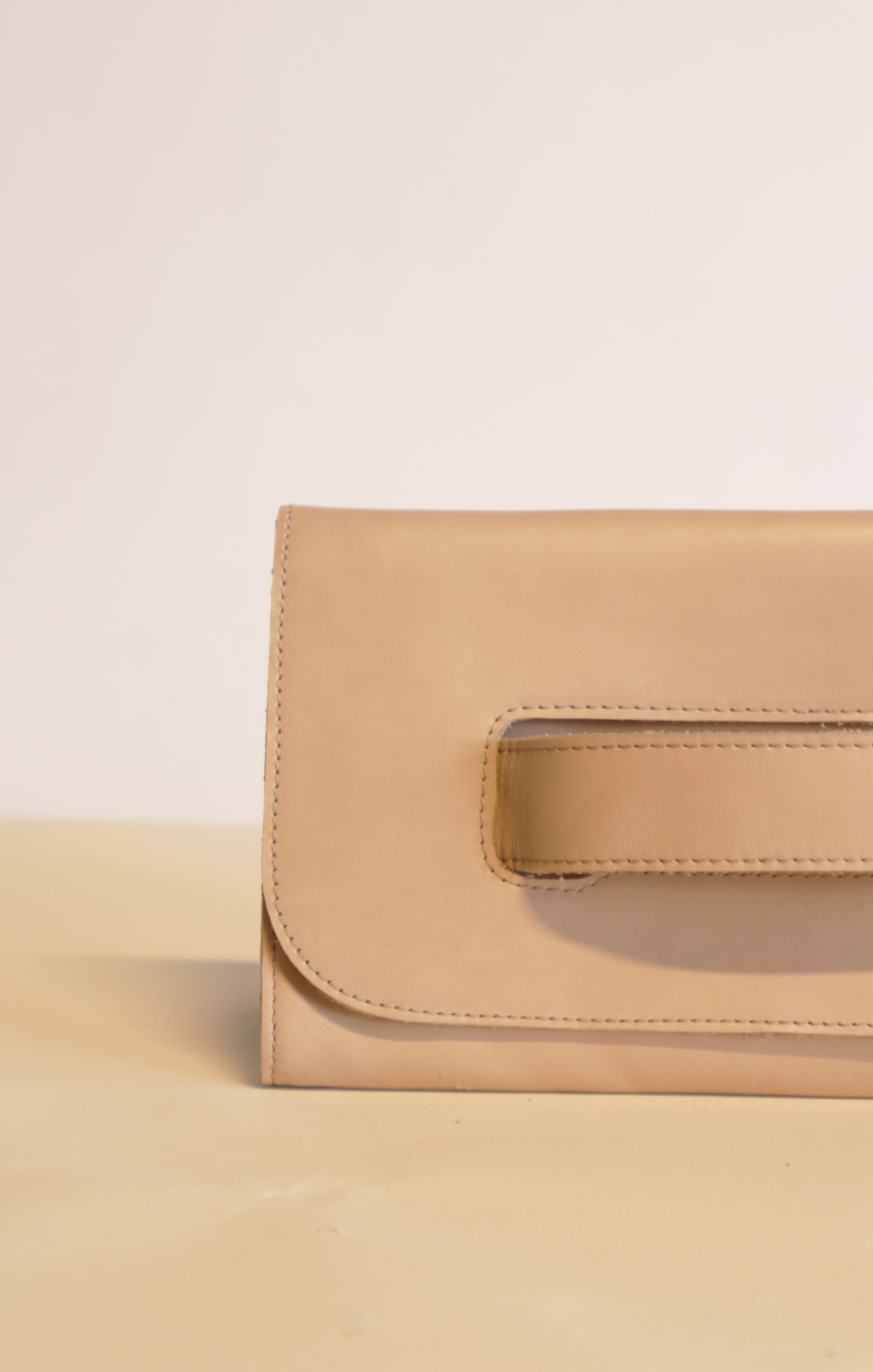 The Mare Handle Clutch in Pebble