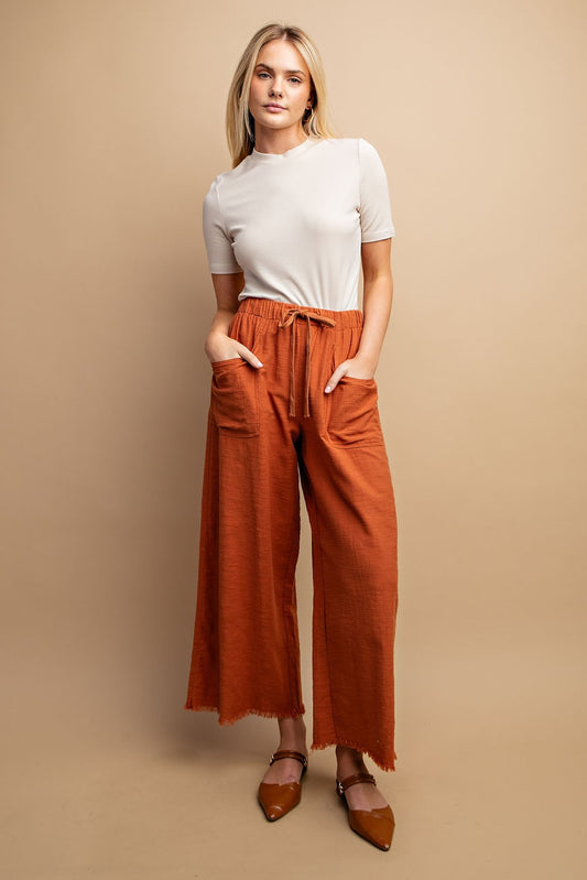 Frayed Hem Cropped Pants in Red Clay