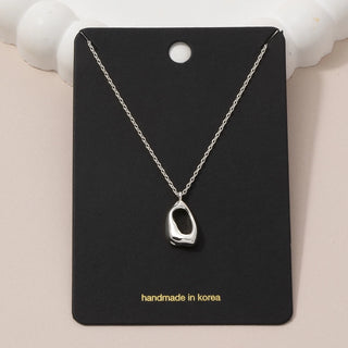 Open-Form Gold Pendant Necklace