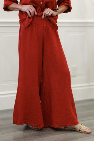 Milio Milano Linen Smocked Waist Palazzo Pants in Rust