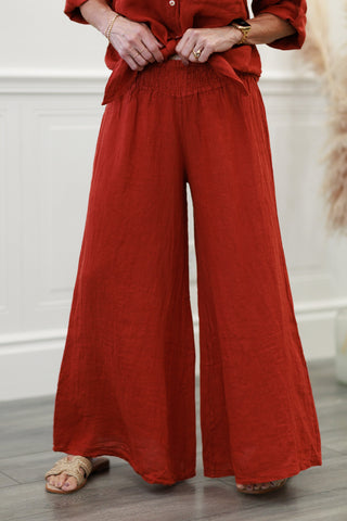 Milio Milano Linen Smocked Waist Palazzo Pants in Rust