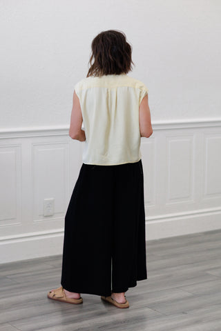 Wide Shoulder Twisted Hem Shirt in Butter Yellow