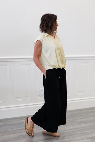 Wide Shoulder Twisted Hem Shirt in Butter Yellow