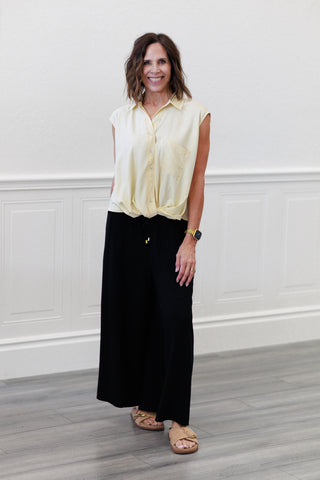 Wide Shoulder Twisted Hem Shirt in Butter Yellow