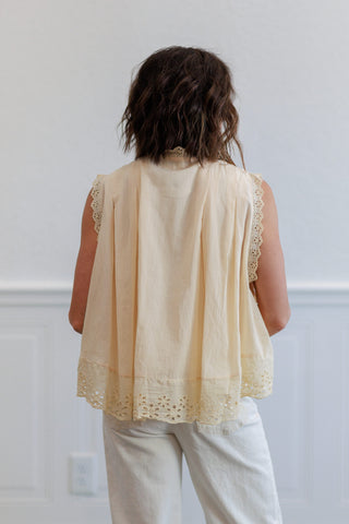 Eyelet Trim Button Front Sleeveless Blouse