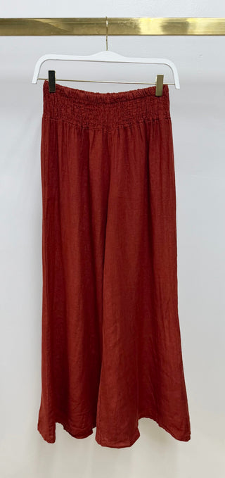 Milio Milano Linen Smocked Waist Palazzo Pants in Rust
