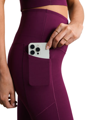 Rhone® Revive™ 7/8 Pocket Legging in Dark Berry
