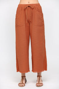 Frayed Hem Cropped Pants in Red Clay